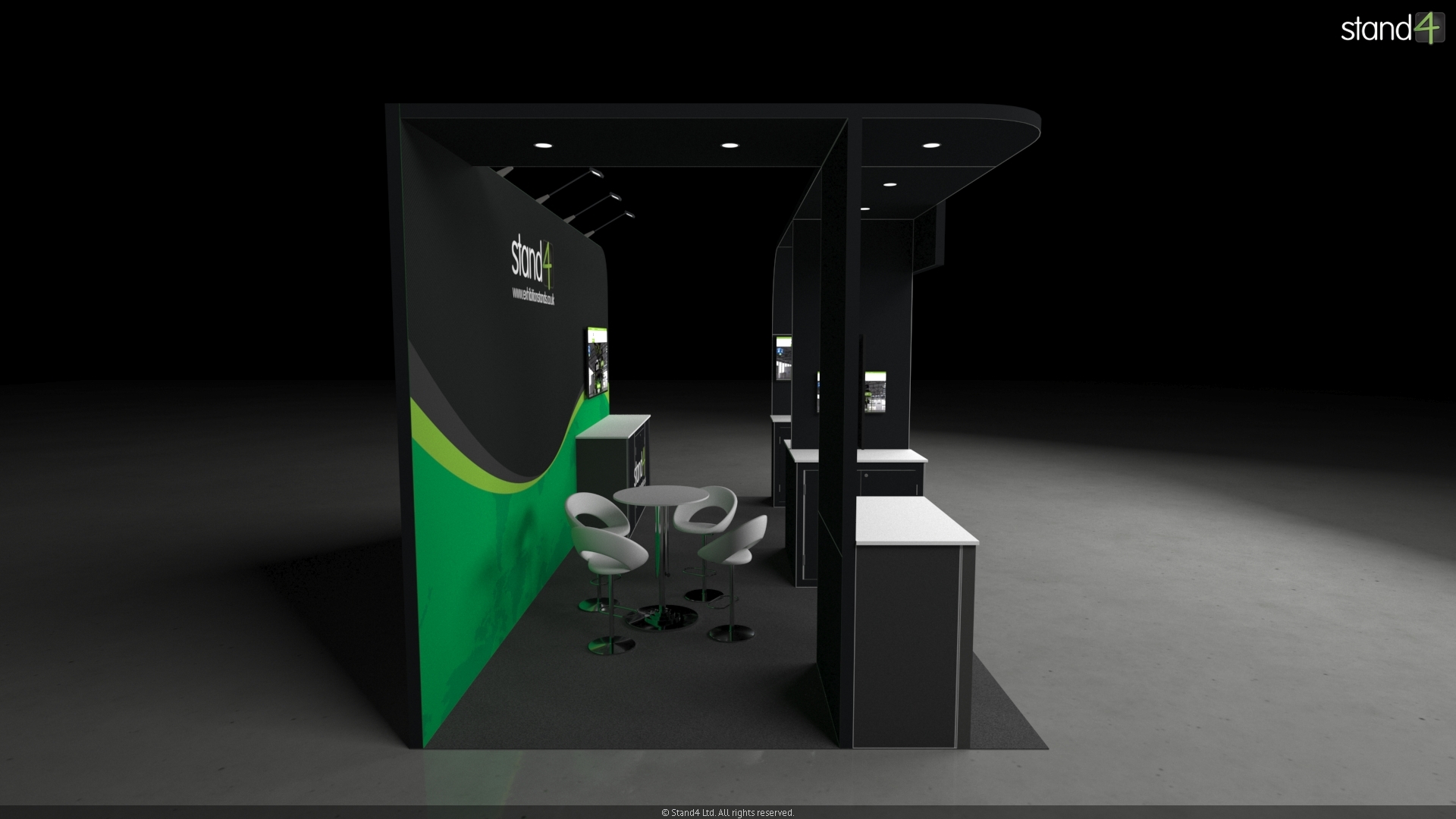 3D rendering of an open-plan exhibition stand featuring a large overhead canopy. The layout includes three front-facing presentation kiosks with digital screens and storage cabinets, a central meeting area with a high-top table and four bar stools, and a backwall equipped with overhead arm lights, a large monitor, and a long built-in counter.