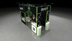 View of a modular, two-open-side 5x2m exhibition stand featuring tall branded walls, a white sofa in a recessed lounge area, a white reception desk, and two cylindrical foreground display units. The stand is optimized for both informal meetings and direct visitor engagement.