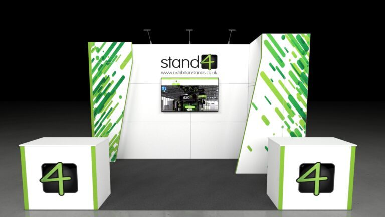 A professional, brightly lit 5x3-meter modular exhibition booth. The stand has a high central back wall with a display monitor, flanked by two angled graphic pillars. Two rectangular counter units are positioned in the foreground. The floor is covered in dark carpet over a light concrete surface.