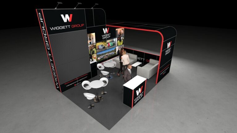 3D render of a modern trade show booth design. The stand features a tall, black and red graphic wall on the left, a semi-enclosed lounge area with grey sofas on the right, and high-top white tables with stylized stools for networking in the centre.
