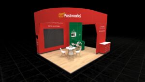 Curved, immersive exhibition stand with a high, curved roof structure. Features a large, integrated display panel and a separate casual meeting area with a round table and chairs.