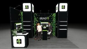 Professional exhibition stand with reception counter (left), central integrated desk, two storage rooms, two TV screens, shelving, and top LED light boxes.